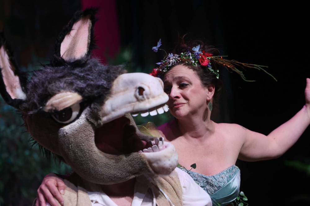 Mecca Productions actors Eric Fjeldsted as Nick Bottom (left) and Michelle Boudreau as Queen Titania rehearse a scene from William Shakespeare’s “A Midsummer Night’s Dream” on Monday at the Western Manitoba Centennial Auditorium. The production opens tonight at 7:30 p.m. and runs through Saturday. (Matt Goerzen/The Brandon Sun)
