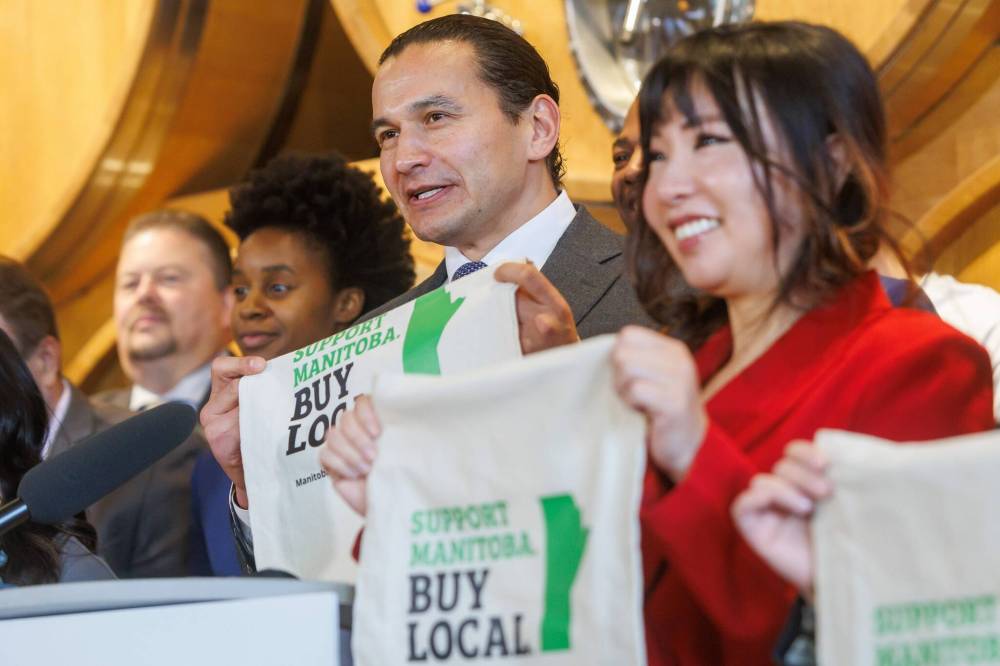 Premier Wab Kinew and NDP caucus members unveiled a new advertising campaign, “Support Manitoba. Buy Local.” during a press conference in Winnipeg earlier this month. (Mike Deal/Winnipeg Free Press)