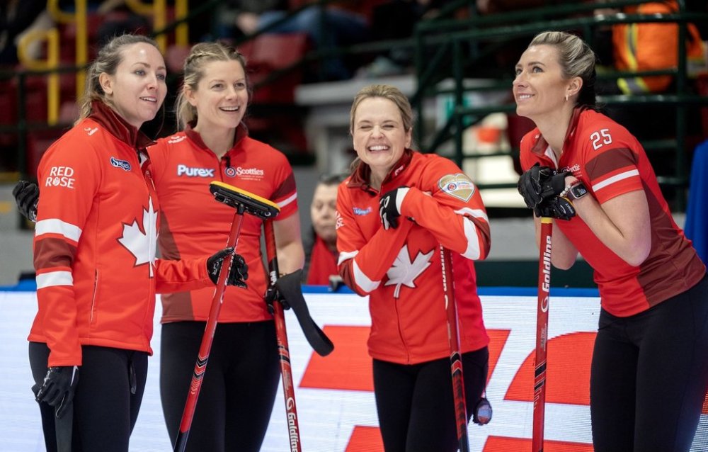 Team Canada (left to right) Rachel Homan, Sarah Wilkes, Tracy Fleury and Emma Miskew share a smile during a timeout in Scotties Tournament of Hearts action against British Columbia in Thunder Bay, Ont. on Wednesday, February 19, 2025. THE CANADIAN PRESS/Frank Gunn
