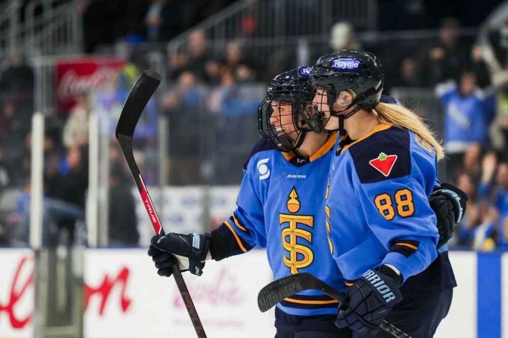 Toronto Sceptres' Julia Gosling (88) congratulates Natalie Spooner (24) on her first goal of the season against the Montreal Victoire during the first period of PWHL hockey action in Toronto on Thursday, March 6, 2025. THE CANADIAN PRESS/Thomas Skrlj