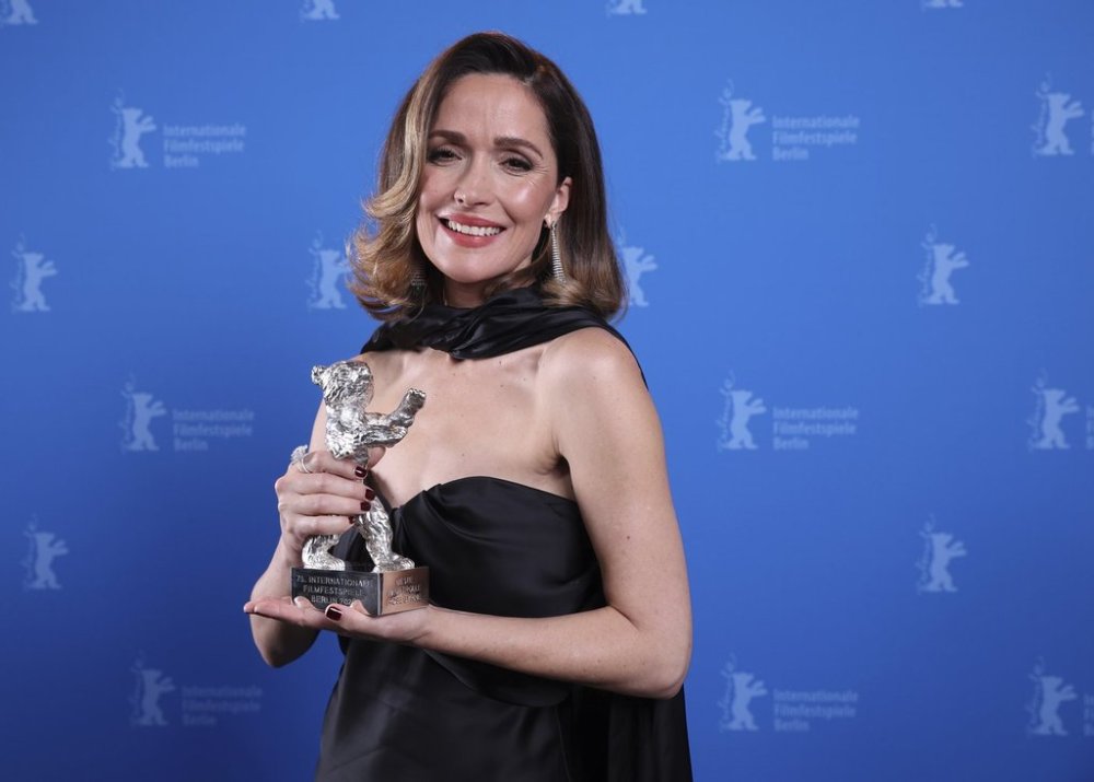 Australian actress Rose Byrne poses with the Silver Bear for Best Leading Performance award during the winner's photocall at the International Film Festival, Berlinale, in Berlin, Saturday, Feb. 22, 2025. (Ronny Hartmann/Pool via AP)