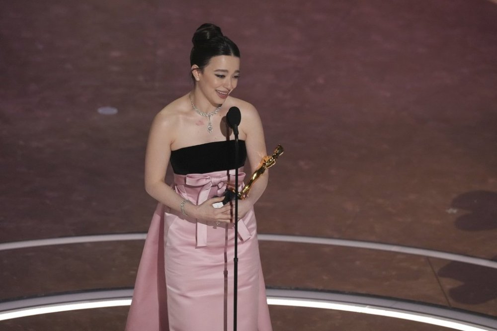 Mikey Madison accepts the award for best performance by an actress in a leading role for