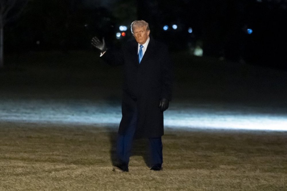 President Donald Trump waves as he walks from Marine One after arriving on the South Lawn of the White House, Wednesday, Feb. 19, 2025, in Washington. (AP Photo/Alex Brandon)