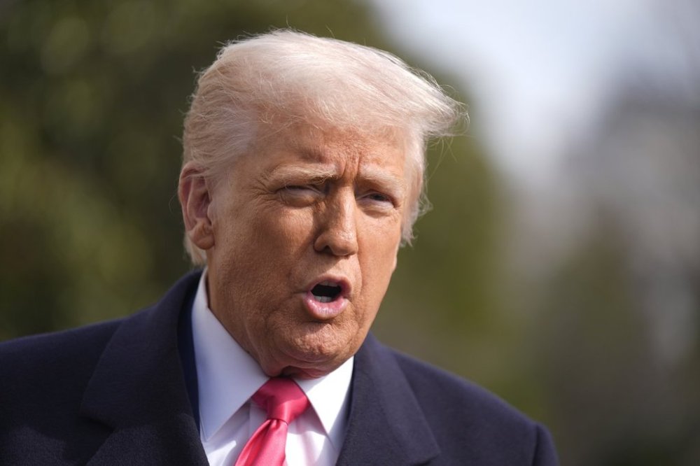 President Donald Trump speaks to reporters before departing the White House in Washington, Saturday, Feb. 22, 2025. THE CANADIAN PRESS/AP, Manuel Balce Ceneta