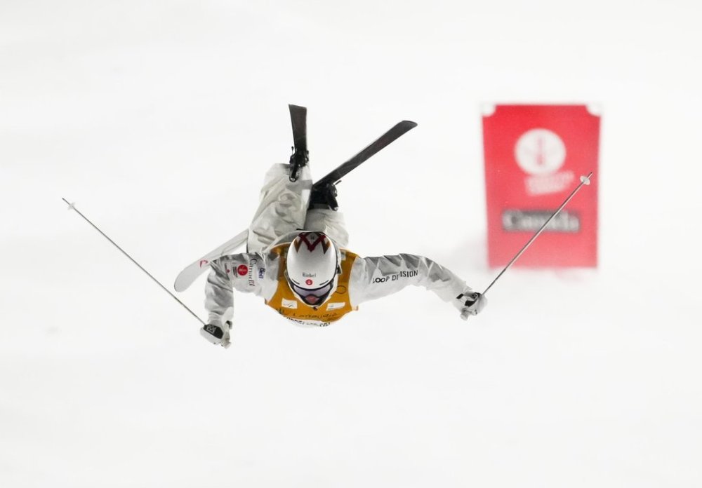 Canada's Mikael Kingsbury skis in men's round of 32 in the World Cup freestyle skiing dual moguls in Saint-Come, Que., Saturday, Feb. 1, 2025. THE CANADIAN PRESS/Sean Kilpatrick