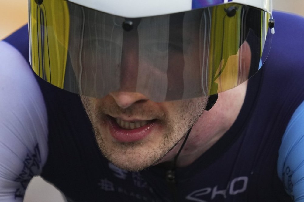 Canada's Derek Gee crosses the finish line of the twenty-first stage of the Tour de France cycling race, an individual time trial over 33.7 kilometers (20.9 miles) with start in Monaco and finish in Nice, France on July 21, 2024. THE CANADIAN PRESS/AP, Daniel Cole