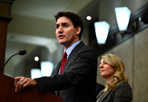 Prime Minister Justin Trudeau addresses media in Ottawa on Saturday following the imposition of a raft of tariffs by U.S. President Donald Trump against Canada, Mexico and China. Trump agreed Monday not to impose tariffs on Canada and Mexico for another month, pulling back from a plan that would have tipped North America into a trade war today. (The Canadian Press files)