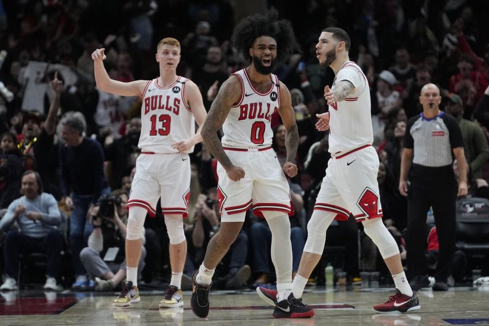 Chicago Bulls guard Coby White (0) reacts after sinking a 3-point basket against the Toronto Raptors during the second half of an NBA basketball game Friday, Feb. 28, 2025, in Chicago. (AP Photo/Erin Hooley)