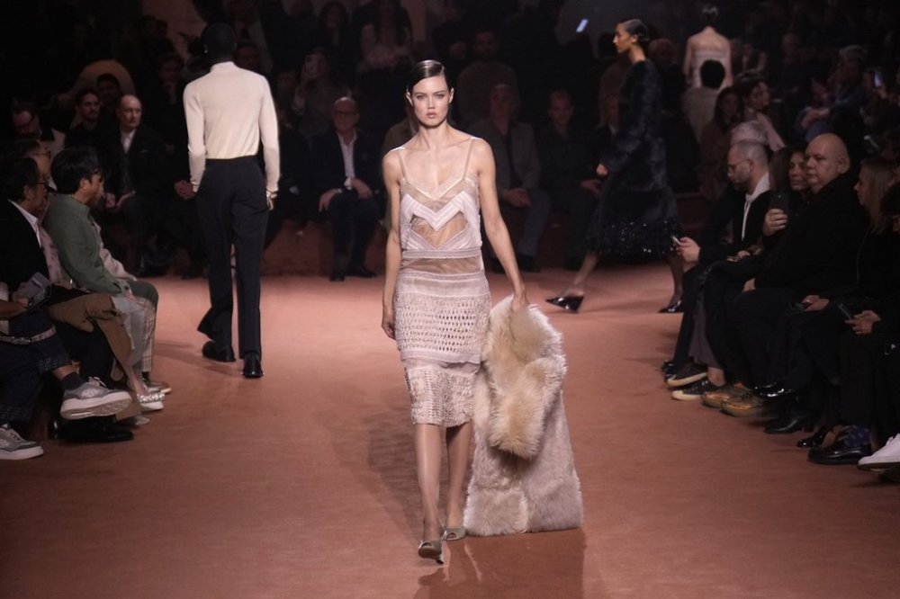 A model wears a creation of the Fendi Fall/Winter 2025-2026 women's collection presented in Milan, Italy, Wednesday, Feb. 26, 2025. (AP Photo/Luca Bruno)