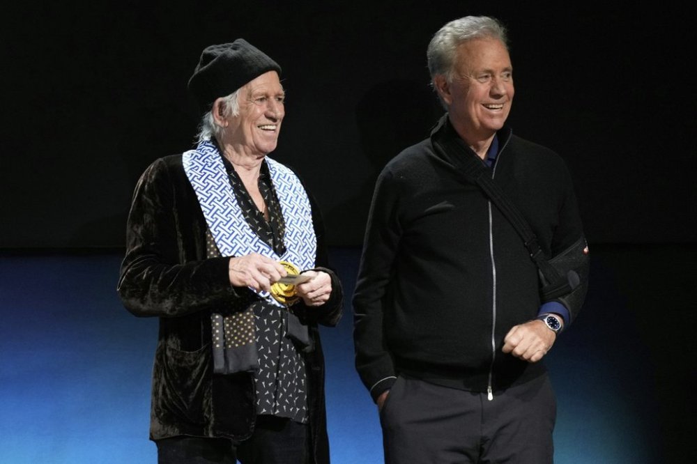 Keith Richards, left, and Connecticut Governor Ned Lamont smile during a ceremony for the presentation of the first Governor's Award of Excellence in Westport, Conn., Wednesday, March 5, 2025. (AP Photo/Seth Wenig)
