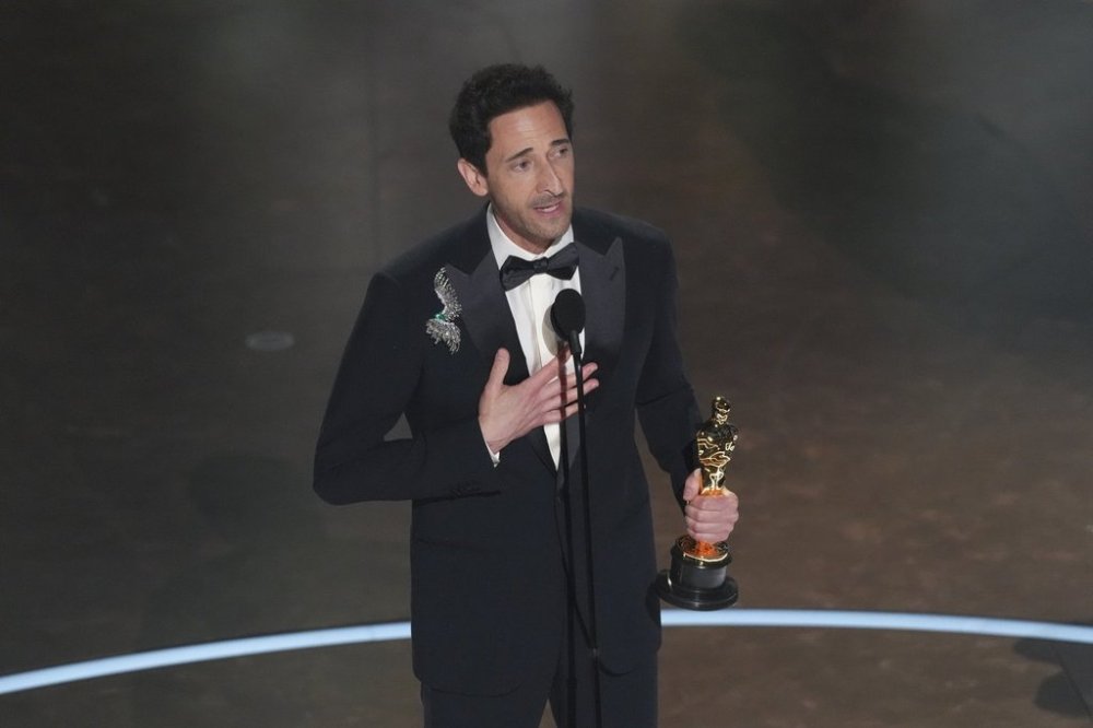 Adrien Brody accepts the award for best performance by an actor in a leading role for