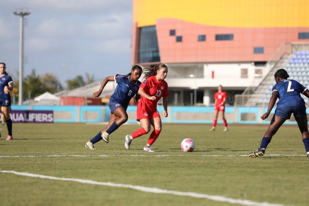 Canada midfielder Teegan Melenhorst (13) moves the ball during Canada's 9-0 win over Bermuda in CONCACAF U-20 Women's qualifying soccer action in Port of Spain, Trinidad, in a Sunday, Feb. 23, 2025, handout photo. THE CANADIAN PRESS/HO-Canada Soccer, *MANDATORY CREDIT*