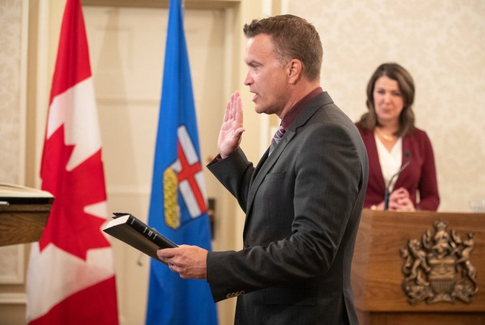Minister of Infrastructure Pete Guthrie is sworn into cabinet, in Edmonton, Friday, June 9, 2023. One day after quitting cabinet and calling out his own government, Peter Guthrie returned to the house Wednesday, sat in the back row and looked at his phone while the Opposition NDP used his words to attack his colleagues. THE CANADIAN PRESS/Jason Franson