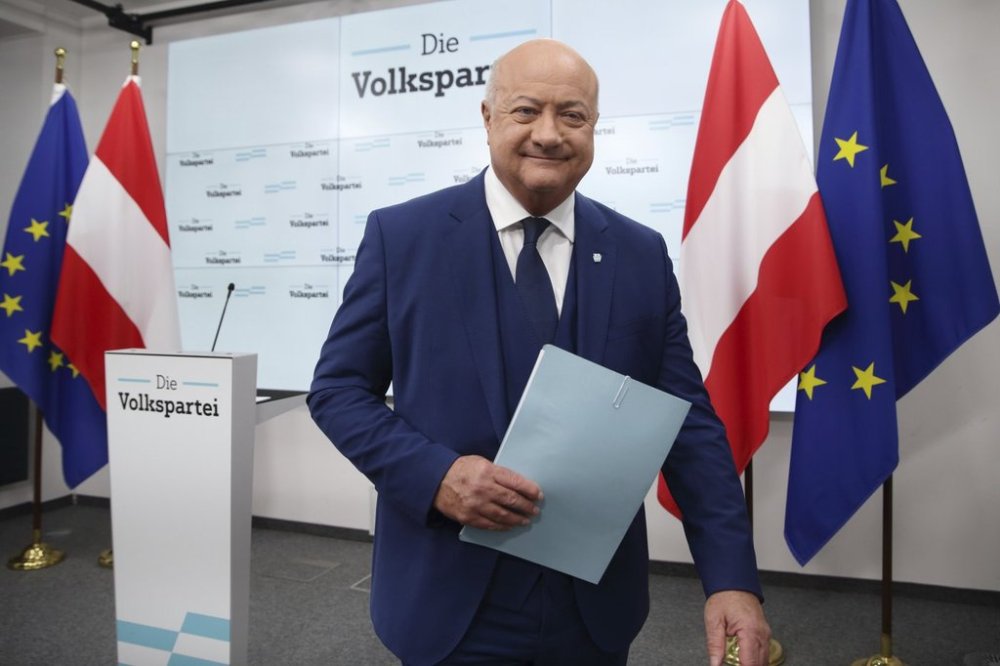Head of Austrian Peoples' Party (OeVP) Christian Stocker leaves a news conference in Vienna, Austria, Wednesday, Feb 12, 2025. (AP Photo/Heinz-Peter Bader)