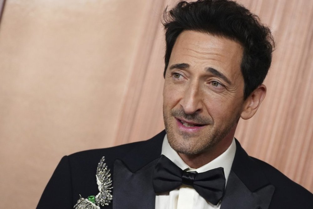 Adrien Brody arrives at the Oscars on Sunday, March 2, 2025, at the Dolby Theatre in Los Angeles. (Photo by Jordan Strauss/Invision/AP)