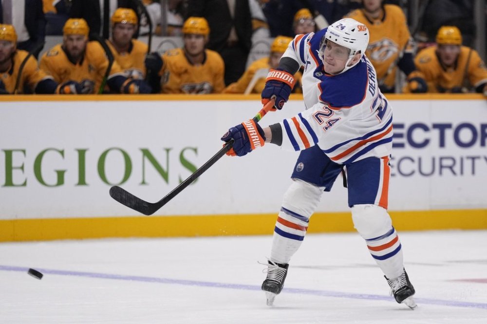 Edmonton Oilers defenseman Travis Dermott (24) plays during the first period of an NHL hockey game against the Nashville Predators, Thursday, Oct. 31, 2024, in Nashville, Tenn. THE CANADIAN PRESS/AP-George Walker IV