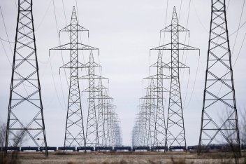 Manitoba Hydro power lines are photographed just outside Winnipeg, Monday, May 1, 2018. Manitoba residents could see their electricity rates rise by 3.5 per cent in each of the next three years if an application by Crown-owned Manitoba Hydro is approved. THE CANADIAN PRESS/John Woods