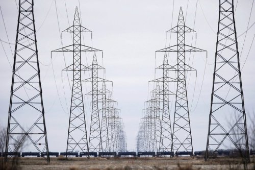 Manitoba Hydro power lines are photographed just outside Winnipeg, Monday, May 1, 2018. Manitoba residents could see their electricity rates rise by 3.5 per cent in each of the next three years if an application by Crown-owned Manitoba Hydro is approved. THE CANADIAN PRESS/John Woods