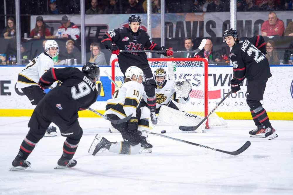 Brandon Wheat Kings goalie Carson Bjarnason (64) focuses on the puck as forward Caleb Hadland (10) tries to block a shot by Lethbridge Hurricanes defenceman Tristen Doyle while forward Trae Johnson (26) jumps to screen the shot and Kash Andresen (25) looks for a rebound in Western Hockey League action at VisitLethbridge.com Arena on Friday. Defenceman Luke Shipley (27) is on the left. Lethbridge won 3-1. (Janise Michel/Lethbridge Hurricanes)
March 7, 2025