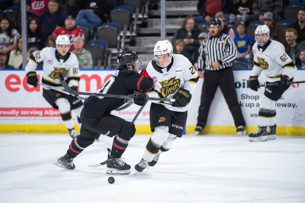 The puck balances on its edge as Brandon Wheat Kings defenceman Luke Shipley (27) looks to pick it up and Lethbridge Hurricanes forward Chase Petersen (20) tries to hit him under the watchful eye of Dominik Petr (82) and Nick Johnson (62) in Western Hockey League action at VisitLethbridge.com Arena on Friday. Lethbridge won 3-1. (Janise Michel/Lethbridge Hurricanes)
March 7, 2025