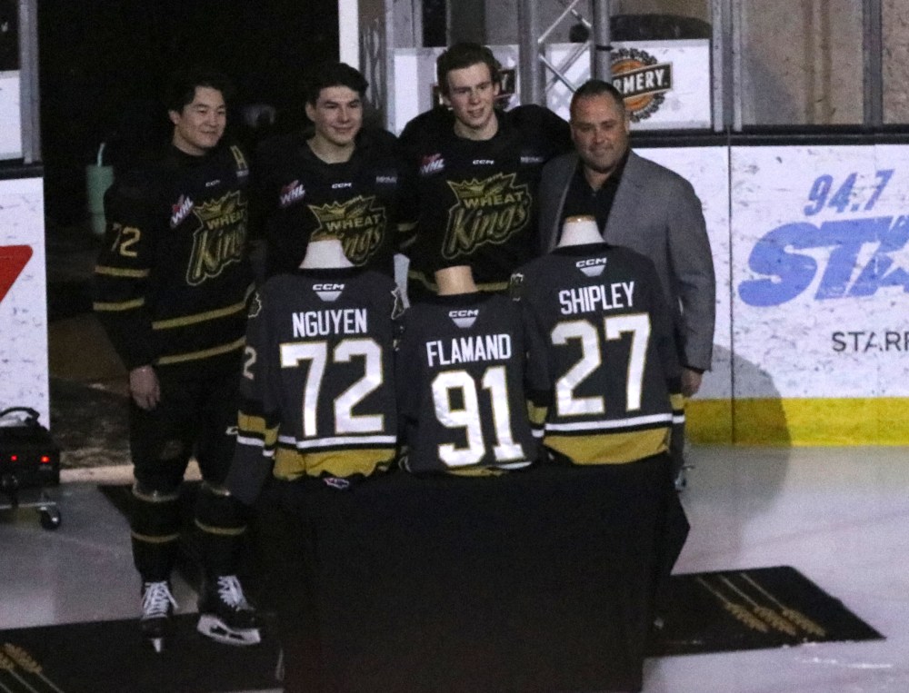 The three graduating overage players from the Brandon Wheat Kings, Marcus Nguyen, Nolan Flamand and Luke Shipley, are presented with framed jerseys by team owner Jared Jacobson prior to last Friday's game against the visiting Regina Pats at Westoba Place. (Perry Bergson/The Brandon Sun)
March 26, 2025