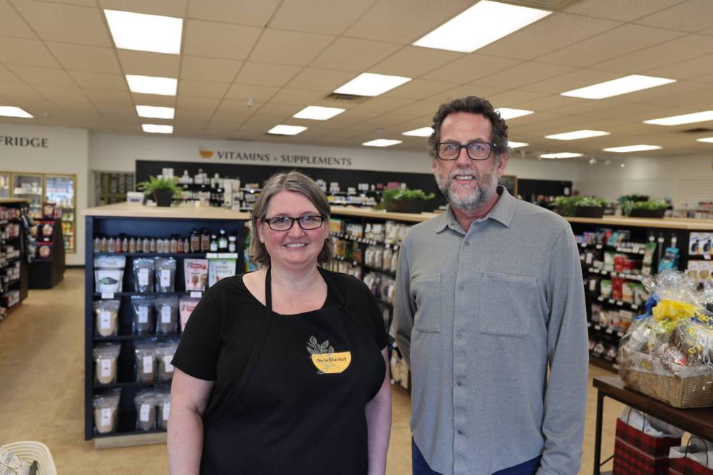 New Market Natural Foods and Kitchen co-owners Cam Wirch (right) and Kim Koversky pose for a picture inside the store Friday afternoon. The owners have taken over and rebranded Two Farm Kids at the strip mall at the corner of Victoria Avenue and 34th Street. (Abiola Odutola/The Brandon Sun)