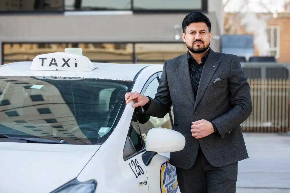Unicity Taxi general manager Abhishek Tara said both Unicity and Duffy’s Taxi in Winnipeg are 100 per cent local and 100 per cent Canadian. (Mikaela MacKenzie/Winnipeg Free Press)