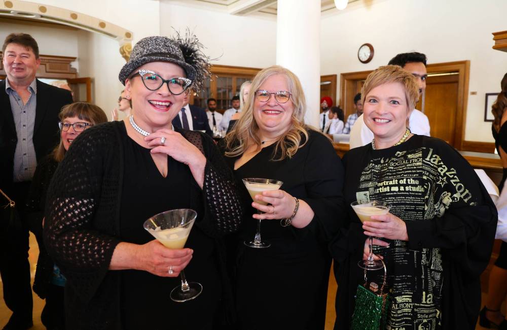 Friends Shelley Hardinge, Sherri Lund and Kerrie Hunter Wilson enjoy themselves at Assiniboine College’s Foundation Legacy Gala at the Manitoba Institute of Culinary Arts building on Thursday evening. (Michele McDougall/The Brandon Sun)