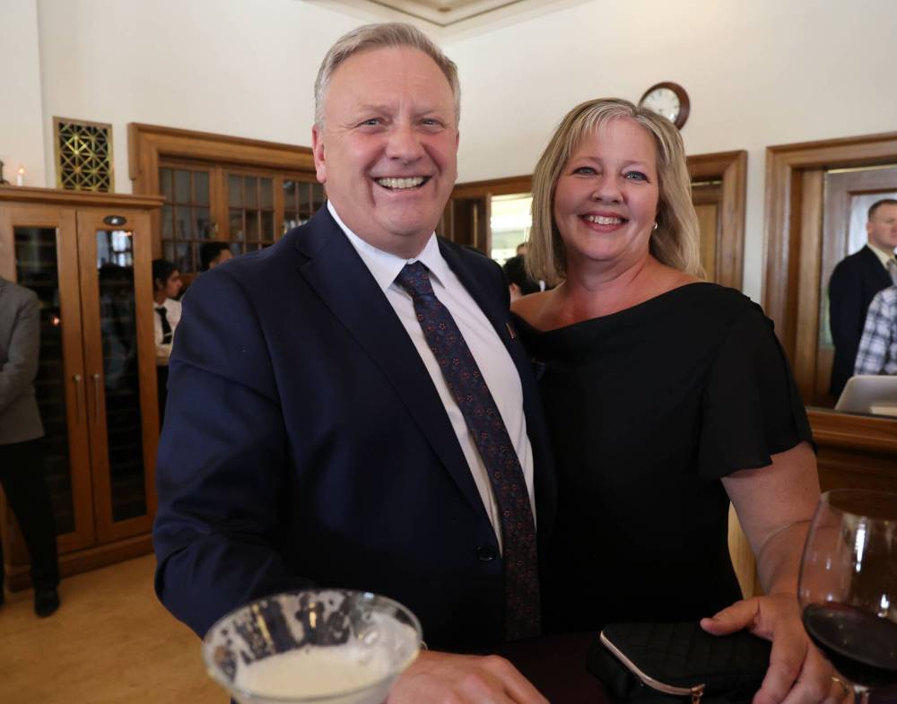 Assiniboine College vice-president Derrick Turner and his wife Tricia. RIGHT: Joanne Johnson, instructor in Assiniboine College’s baking foundations program, slices the focaccia bread for those attending the Foundation Legacy Gala.