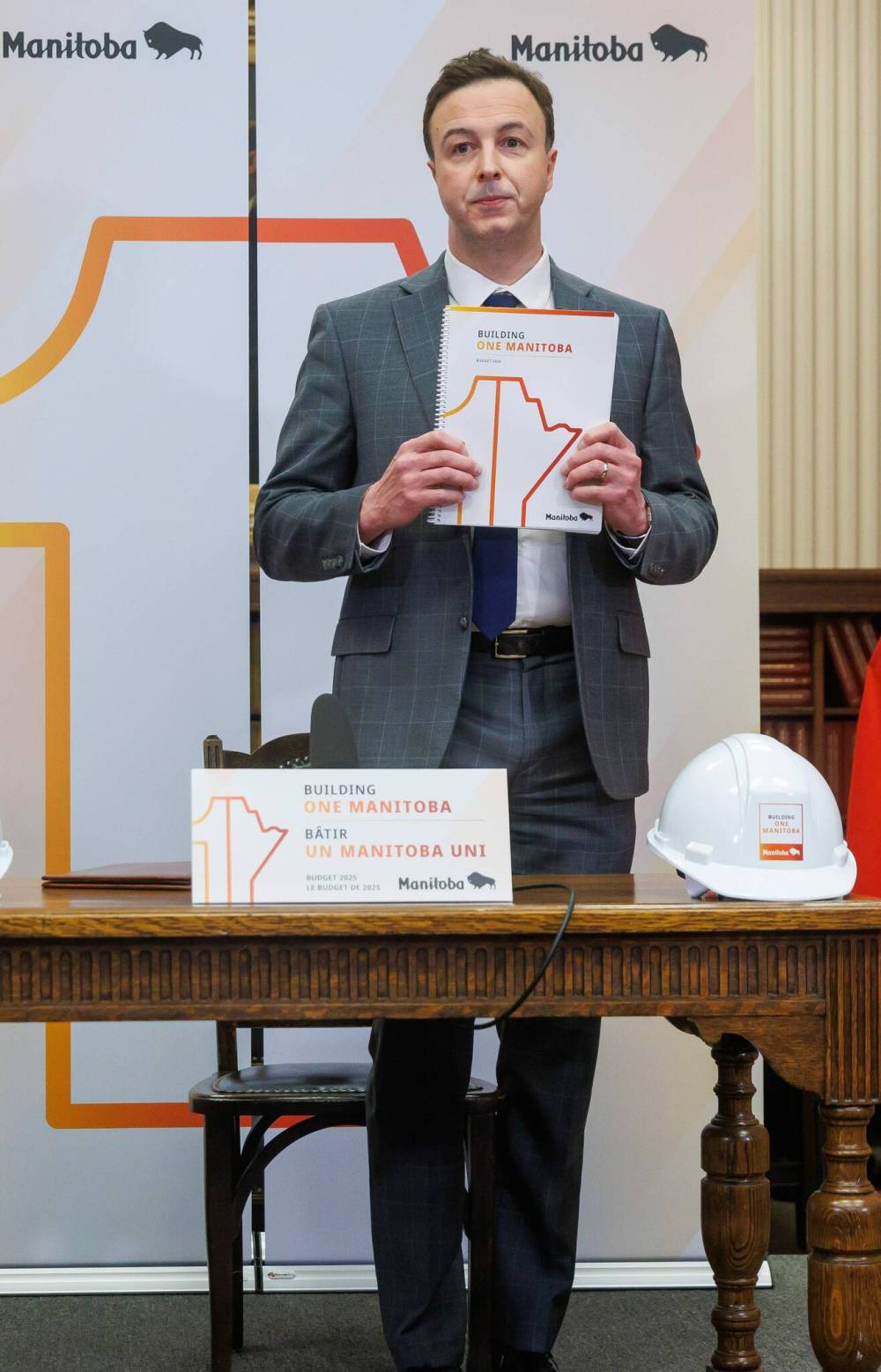 Manitoba Finance Minister Adrien Sala talks to the media prior to tabling the 2025 budget Thursday afternoon at the Manitoba Legislative Assembly. (Mike Deal/Winnipeg Free Press)