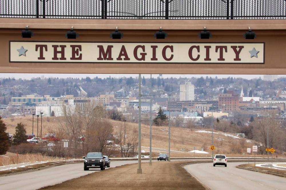 A footbridge over Highway 83 leading into Minot, N.D., proclaims the city’s slogan. Minot’s status as a popular destination for visitors from Manitoba and Saskatchewan is jeopardized by the current tariff war between the U.S. and Canada. (Tim Smith/The Brandon Sun)