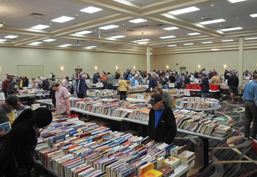 Interested readers check out tables full of books at the 2024 Rotary Club of Brandon Fall Book Sale. The Rotary Club’s Spring Book Sale will take place April 3-5 in the Victoria Inn’s Imperial Ballroom. (Courtesy Don Partrick)