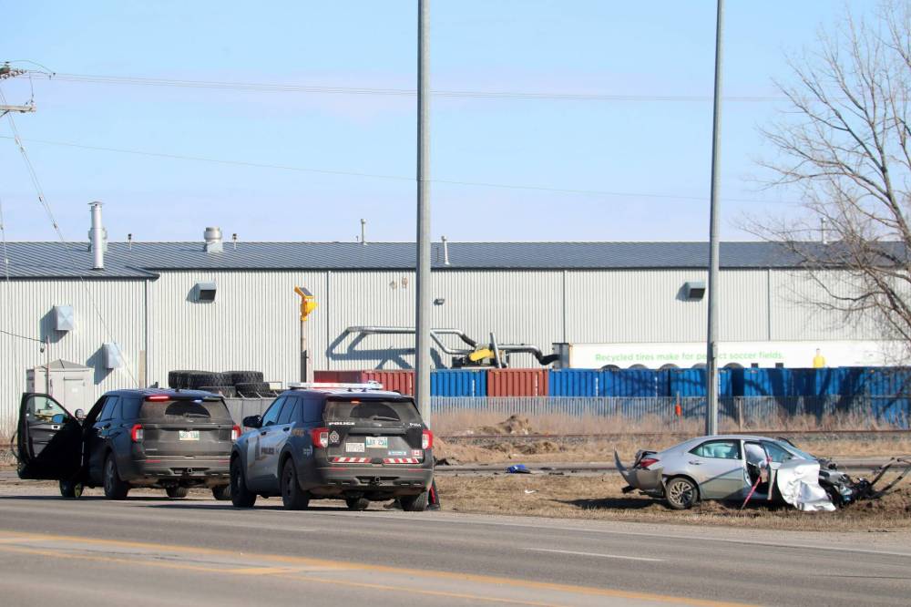Brandon police investigate the scene of an accident at the intersection of Richmond Avenue East and Highway 110 east of Brandon on Tuesday afternoon. Traffic through the intersection was closed for part of Tuesday as emergency crews and investigators worked at the scene. (The Brandon Sun)