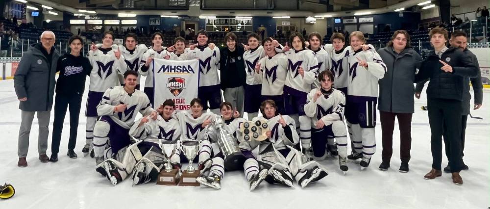 The Vincent Massey Vikings celebrate capturing the Westman High School Hockey League championship Wednesday night in Dauphin. (Submitted)
