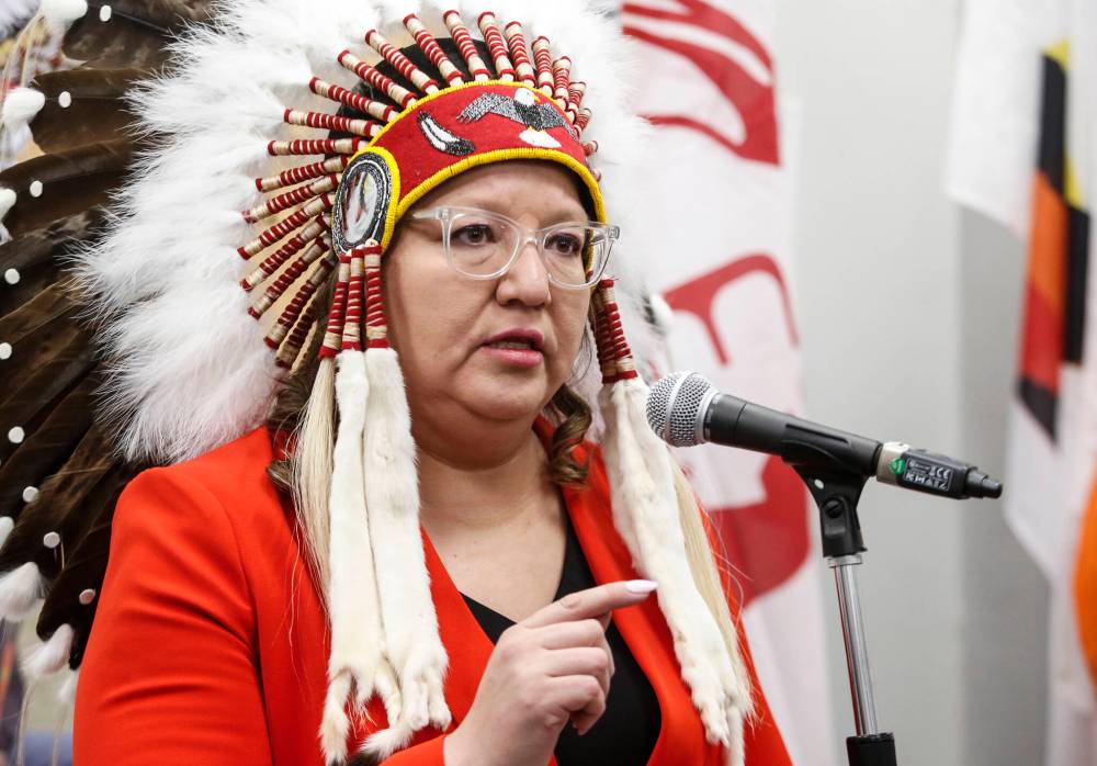 Assembly of First Nations National Chief Cindy Woodhouse speaks at an Assembly of Manitoba Chiefs (AMC) press conference in Winnipeg on Thursday for Theresa and Albert Shingoose, parents of Ashlee Shingoose. (John Woods/The Canadian Press)