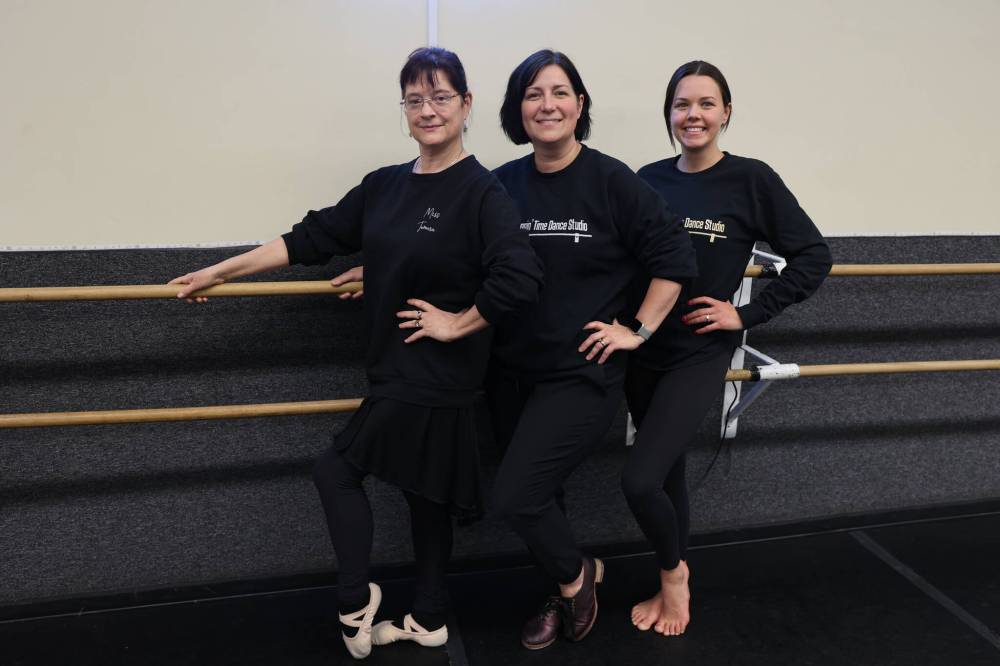 Steppin’ Time Dance Studio long-time instructor Tamara Hicks (from left)owner Monique Roy-Keller and ballet instructor Brooke Webber pose for a picture in the studio on Saturday afternoon. (Abiola Odutola/The Brandon Sun)