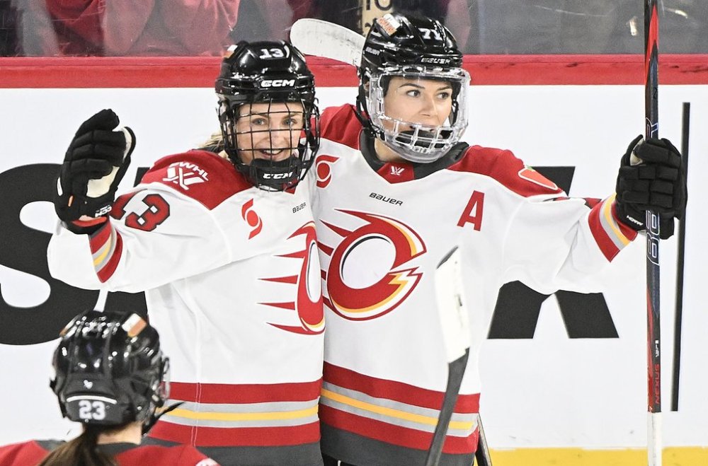 Ottawa Charge's Tereza Vanisova (13) celebrates with teammate Jincy Roese (71) after scoring against the Montreal Victoire during first period PWHL hockey action in Laval, Que., Wednesday, January 29, 2025. THE CANADIAN PRESS/Graham Hughes