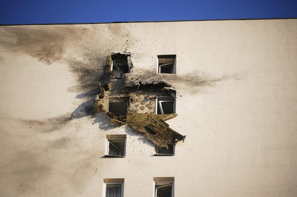 This photo shows an apartment building where the downed Ukrainian drone fell at an area in Sapronovo village outside Moscow, Russia, on Tuesday, March 11, 2025. (AP Photo)