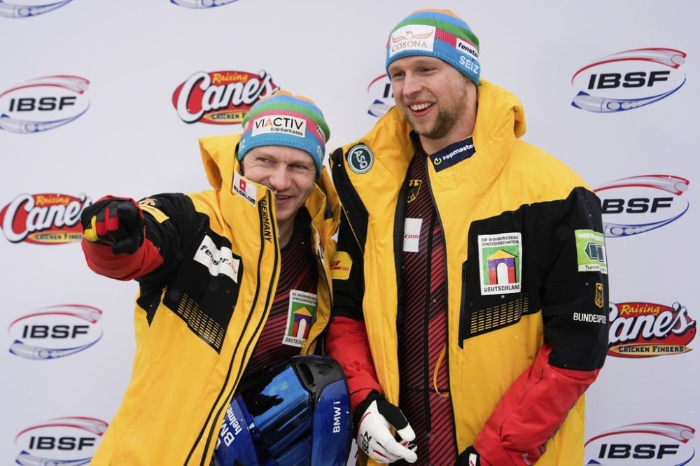 Francesco Friedrich and Alexander Schuller, of Germany, react after winning first place in the two-man bobsled at the bobsledding world championships, Sunday, March 9, 2025, in Lake Placid, N.Y. (AP Photo/Julia Demaree Nikhinson)