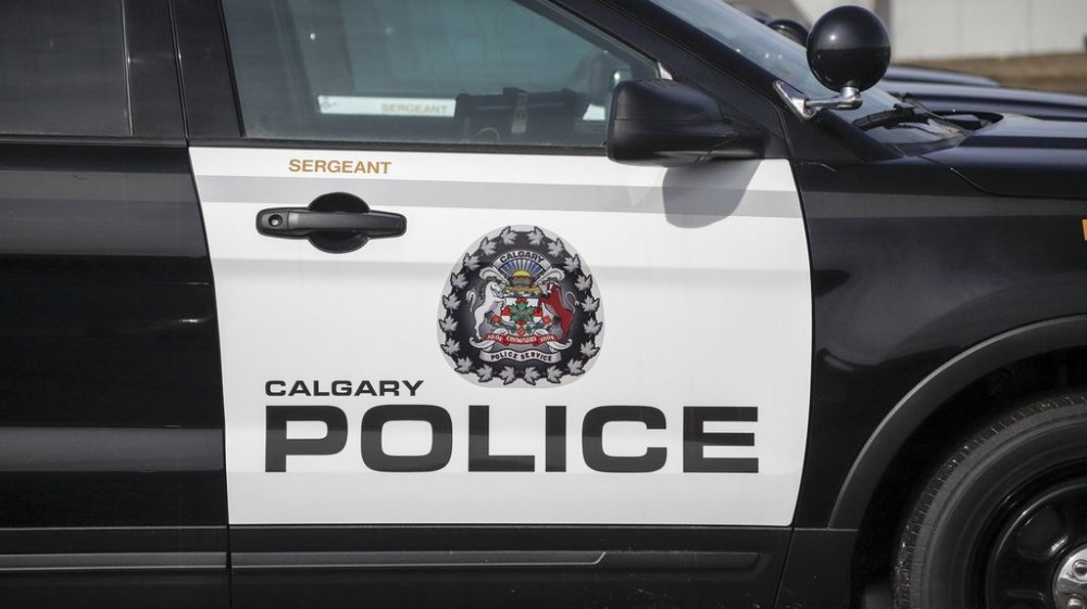 Police vehicles are seen at Calgary Police Service headquarters in Calgary on April 9, 2020. THE CANADIAN PRESS/Jeff McIntosh