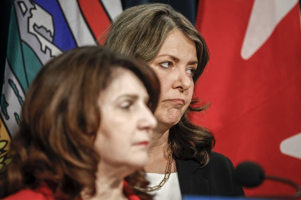 Alberta Premier Danielle Smith, right, and Minister of Health Adriana LaGrange provide an update on what steps the government is taking related to allegations by former Alberta Health Services CEO Athana Mentzelopoulos, in Calgary, Wednesday, Feb. 19, 2025. THE CANADIAN PRESS/Jeff McIntosh