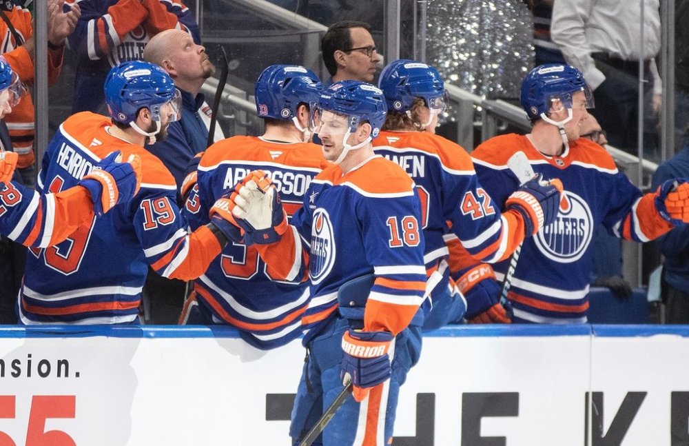 Edmonton Oilers' Zach Hyman (18) celebrates a goal against the Utah Hockey Club during first period NHL action in Edmonton on Tuesday, March 18, 2025. THE CANADIAN PRESS/Jason Franson