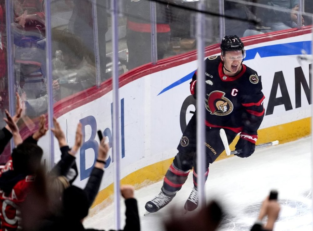Ottawa Senators' Brady Tkachuk (7) celebrates his game winning goal against the New York Rangers during overtime period NHL hockey action in Ottawa, on Saturday, March 8, 2025. THE CANADIAN PRESS/Justin Tang