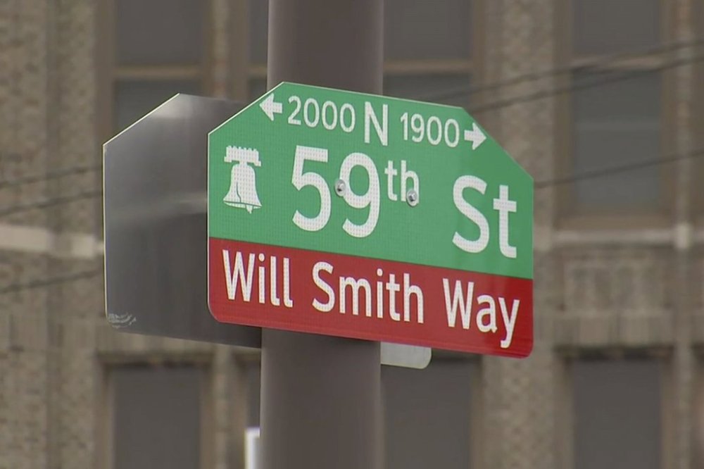 A sign at the intersection of North 59th Street and Lancaster Avenue in West Philadelphia has been renamed after Will Smith on Wednesday, March 26, 2025. (WPVI-TV via AP)