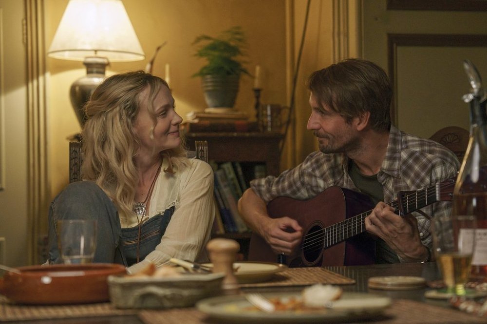This image released by Focus Features shows Carey Mulligan, left, and Tom Basden in a scene from
