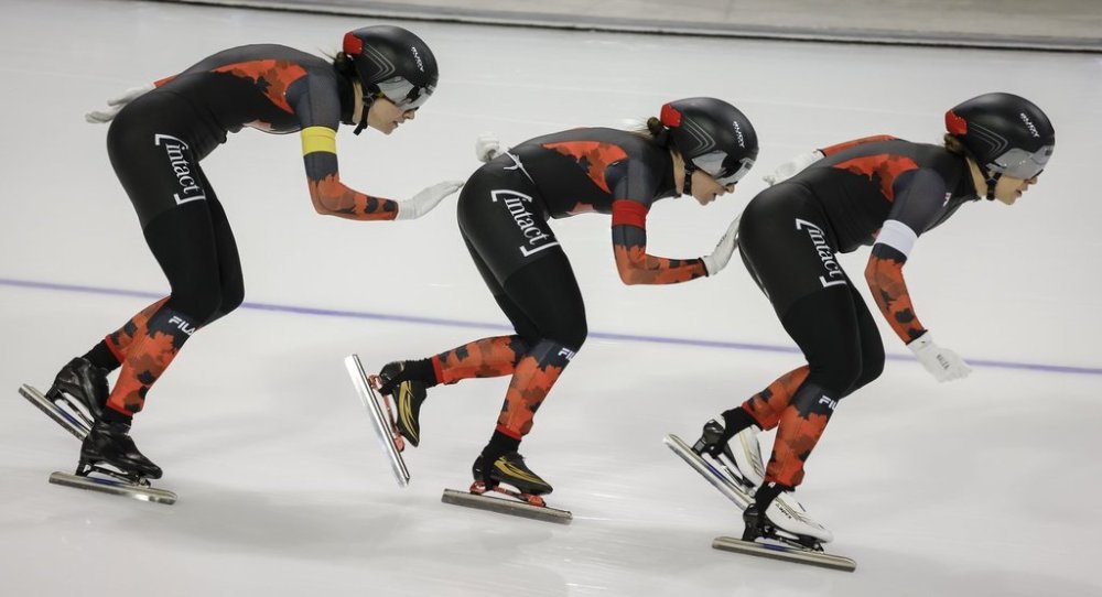 Canada's Valerie Maltais, right to left, Ivanie Blondin and Isabelle Weidemann skate during the women's team pursuit event at the ISU World Speed Skating Championships in Calgary, Alta., Friday, Feb. 16, 2024.THE CANADIAN PRESS/Jeff McIntosh