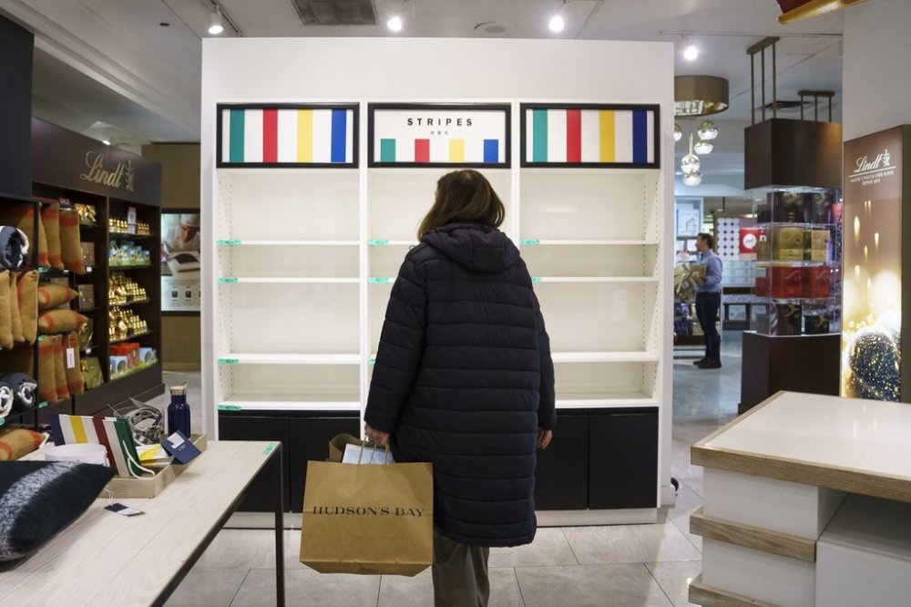 Shoppers browse a Hudson's Bay in Toronto on Monday, March 17, 2025. THE CANADIAN PRESS/Christopher Katsarov