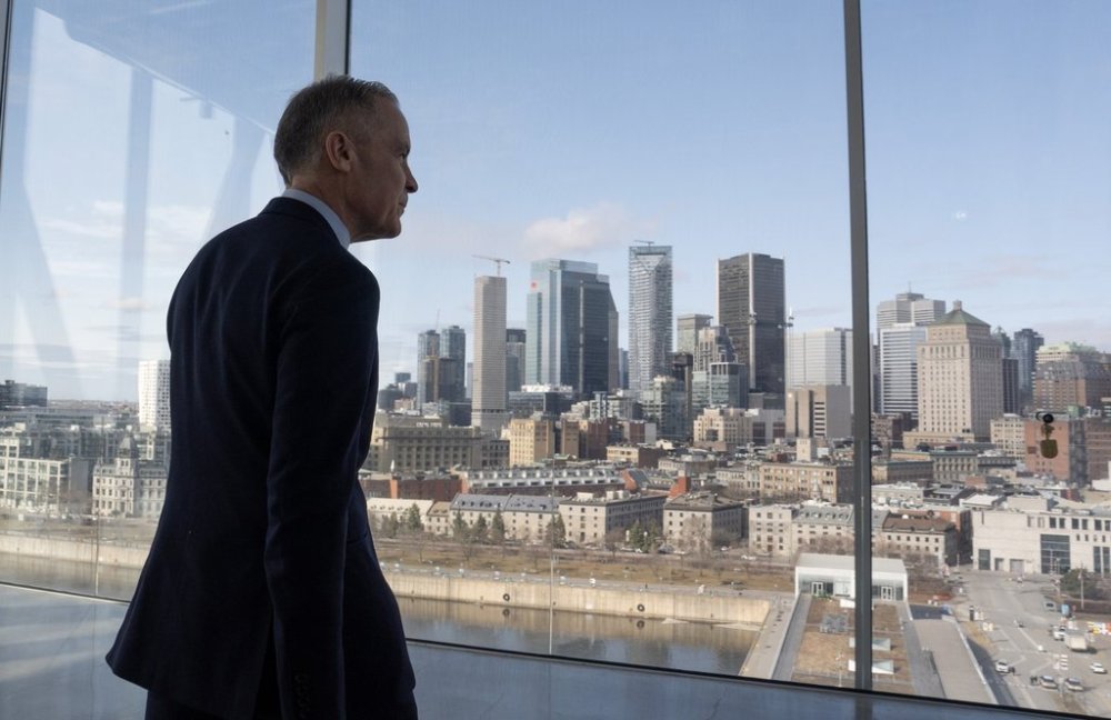 Liberal leader Mark Carney makes his way to the podium to speak during a campaign event on Friday, April 4, 2025 in Montreal. THE CANADIAN PRESS/Adrian Wyld