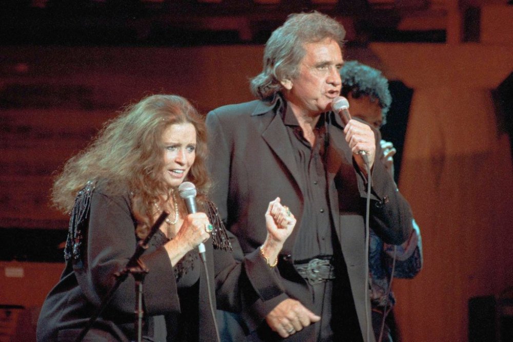 FILE - In this Oct. 16, 1992, file photo, singers June Carter Cash and husband Johnny Cash perform at New York's Madison Square Garden. (AP Photo/Ron Frehm, File)