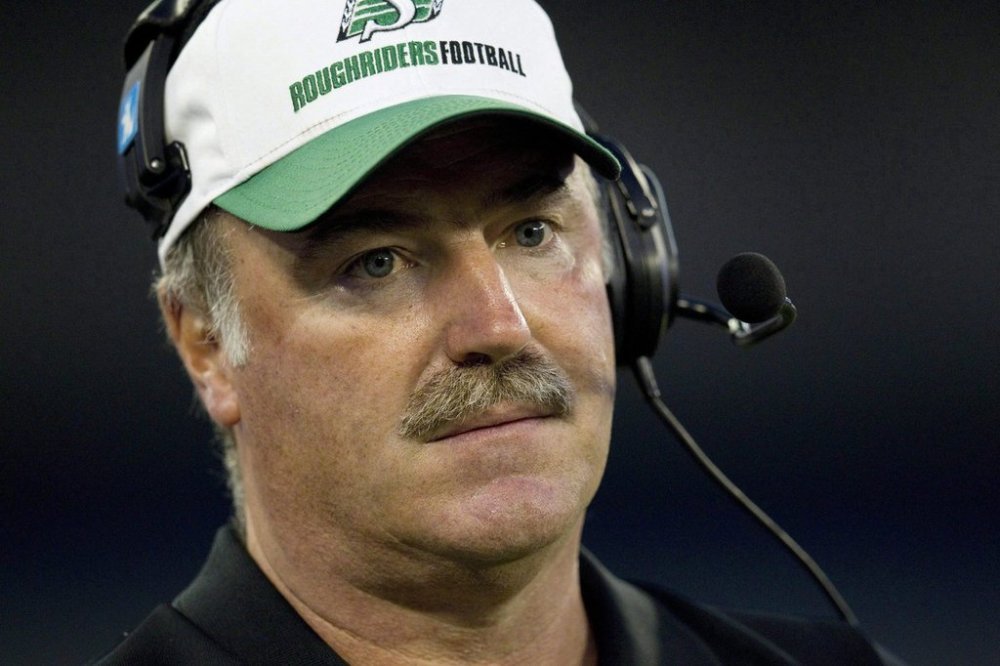 Saskatchewan Roughriders head coach Greg Marshall watches during first half CFL action against the Argonauts in Toronto on Thursday August 18, 2011. THE CANADIAN PRESS/Frank Gunn